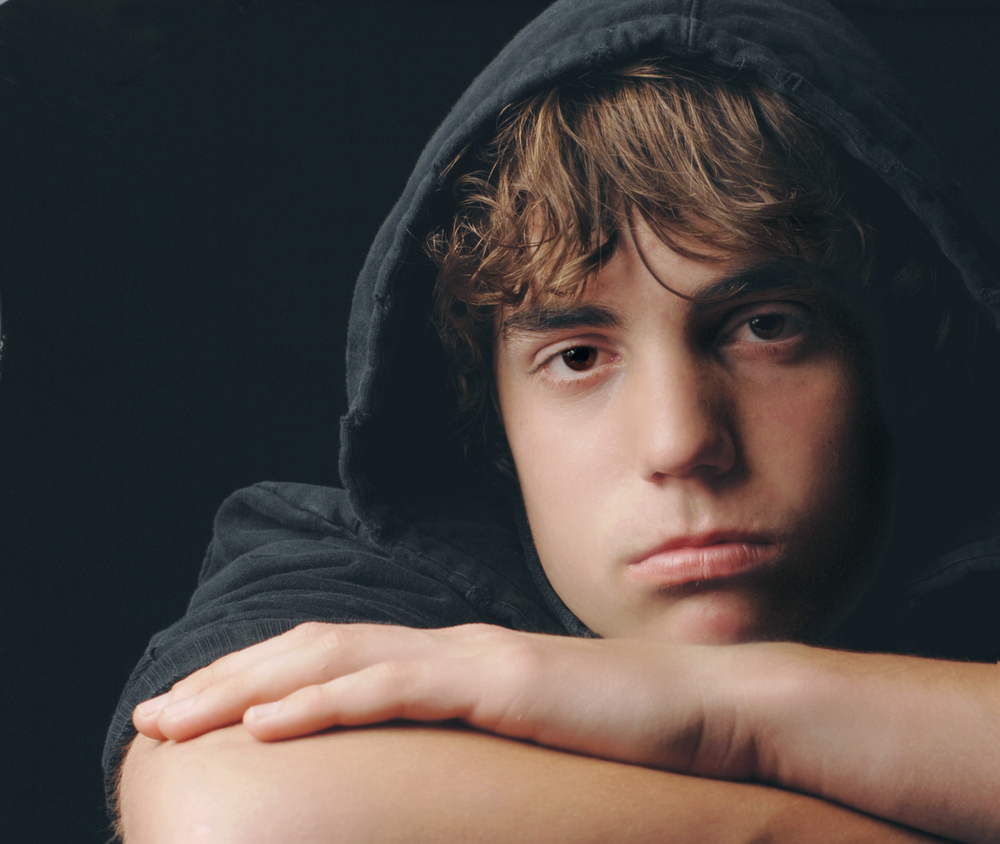 Depressed teen boy