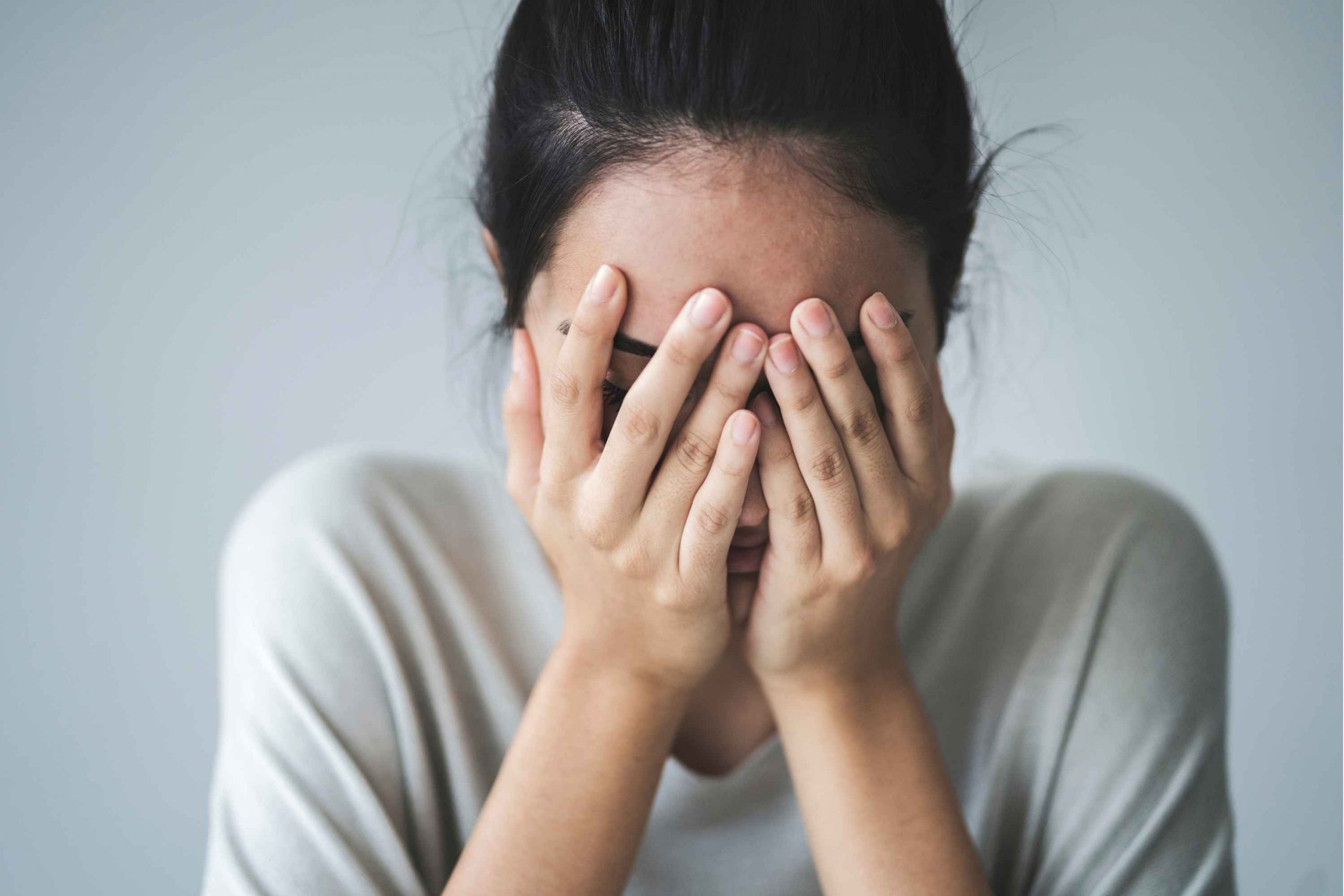 Individual experiencing stress and anxiety